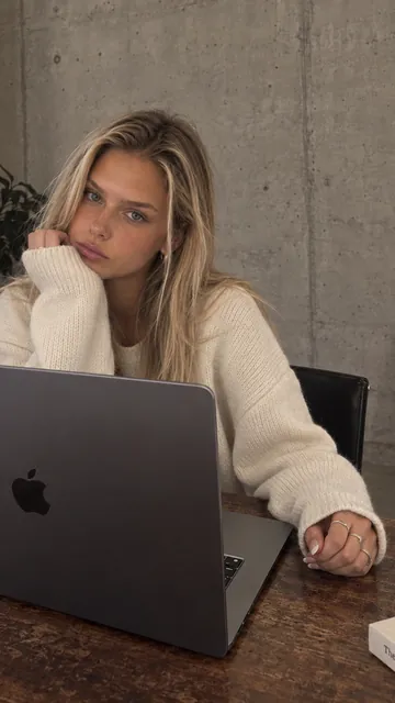 At a laptop