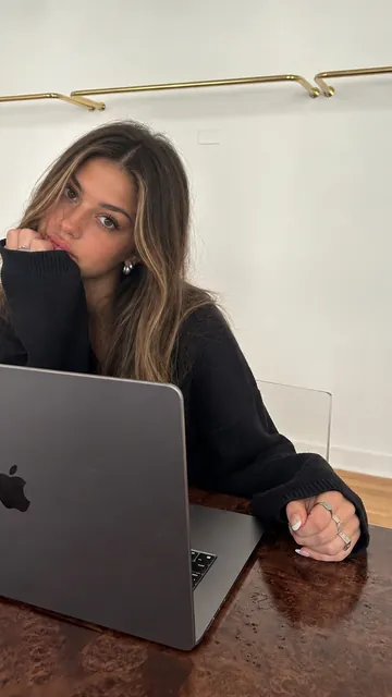 At a laptop